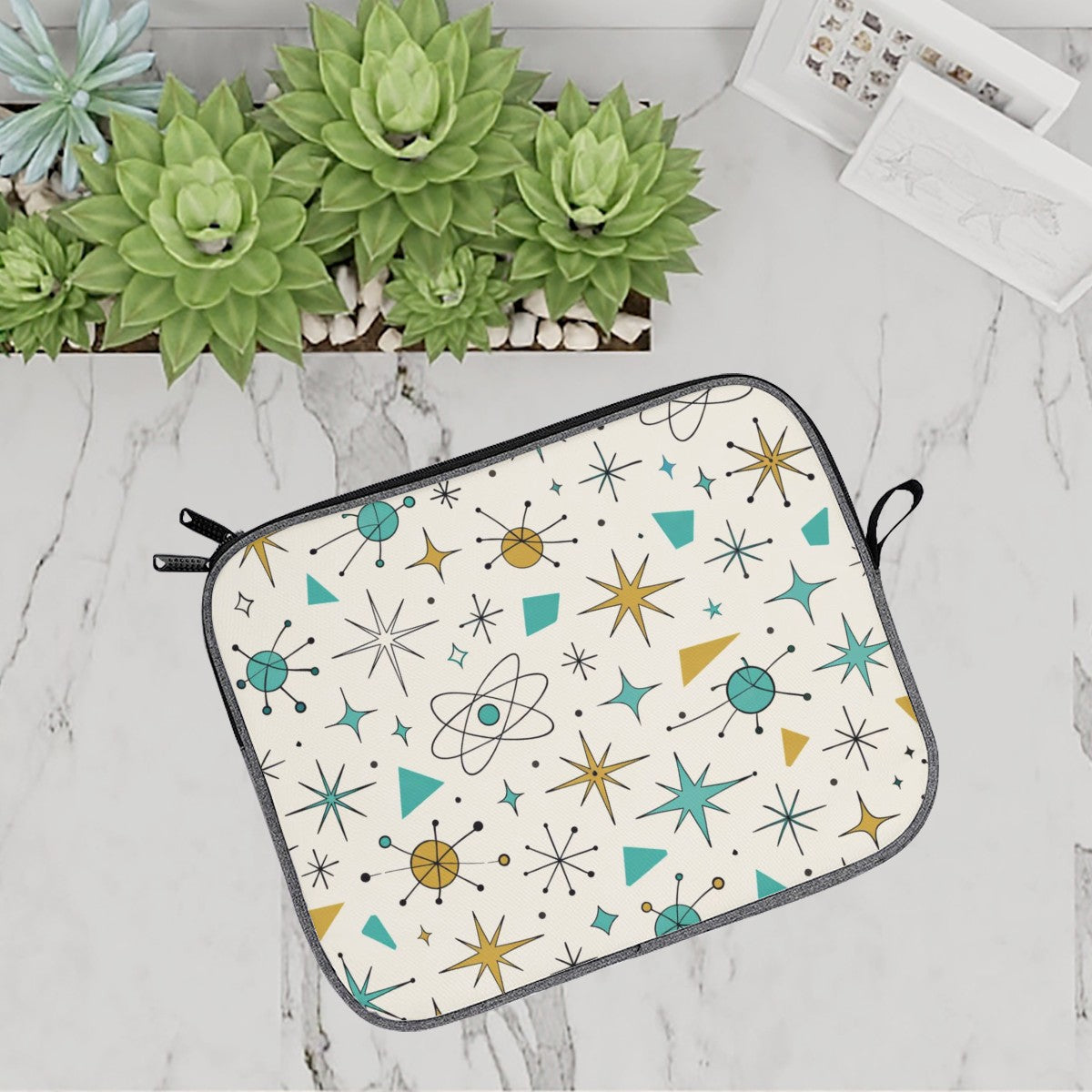 Atomic Stardust Laptop Sleeve - Carry Your Tech in Retro Style!